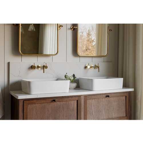 The brief for this ensuite was for it to be calming, neutral and have a grown-up feel. The bespoke vanity hides away all the usual bathroom clutter, (including charging for the toothbrushes). Swipe to see the freestanding bath against the limewashed walls. Limewash is perfect for bathrooms. It’s breathable, nontoxic, and eco-friendly. The high pH level means that it’s naturally bacteria and mold resistant.